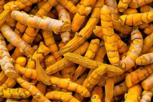 turmeric-root-texture-background-dry-curcuma-long-pattern-ginger-mockup-dry-spice-seasoning-banner_162695-44661